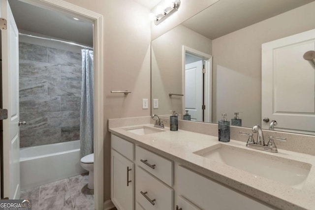 592 Eagles Nest Cir, Auburn, GA 30011 - full bathroom featuring toilet, double vanity, and shower / bath combination with curtain