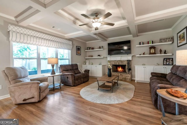 592 Eagles Nest Cir, Auburn, GA 30011 - living room with light wood-type flooring, coffered ceiling, a ceiling fan, a fireplace, and beamed ceiling