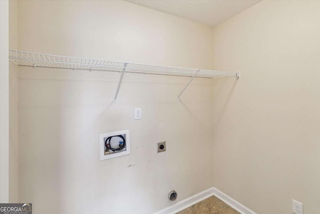 500 Wyckfield Way, Hinesville, GA 31313 - washroom featuring electric dryer hookup, baseboards, and hookup for a washing machine