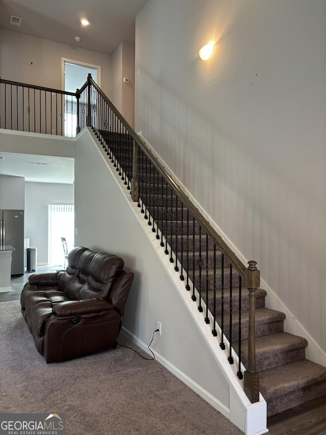 457 Panhandle Pl, Hampton, GA 30228 - staircase featuring baseboards, carpet, and recessed lighting