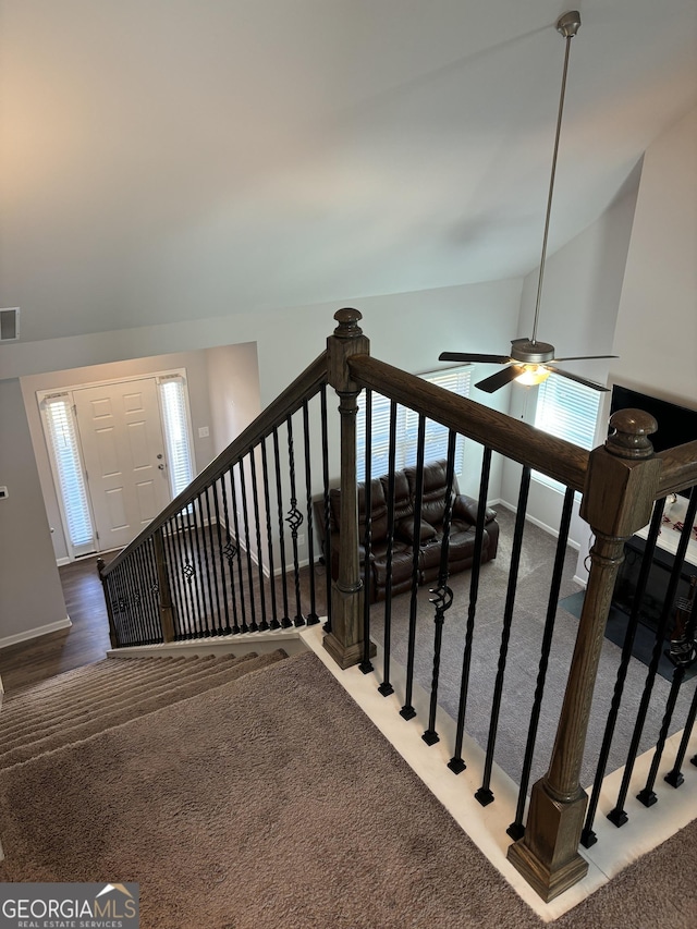 457 Panhandle Pl, Hampton, GA 30228 - staircase with a ceiling fan, baseboards, vaulted ceiling, and carpet floors