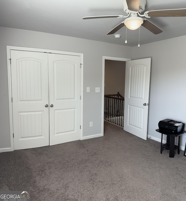 457 Panhandle Pl, Hampton, GA 30228 - bedroom featuring carpet flooring, baseboards, a closet, and ceiling fan