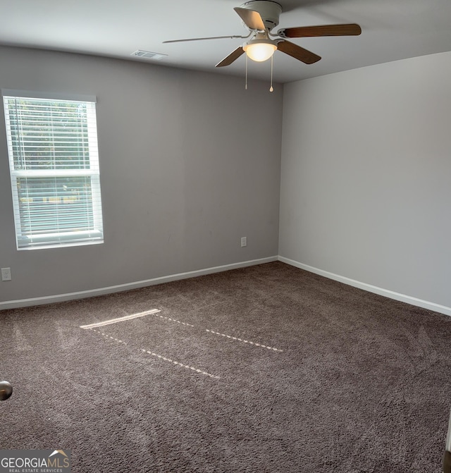 457 Panhandle Pl, Hampton, GA 30228 - empty room featuring ceiling fan, carpet, and baseboards
