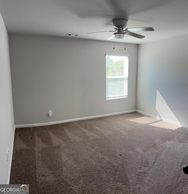 457 Panhandle Pl, Hampton, GA 30228 - carpeted spare room with ceiling fan and baseboards