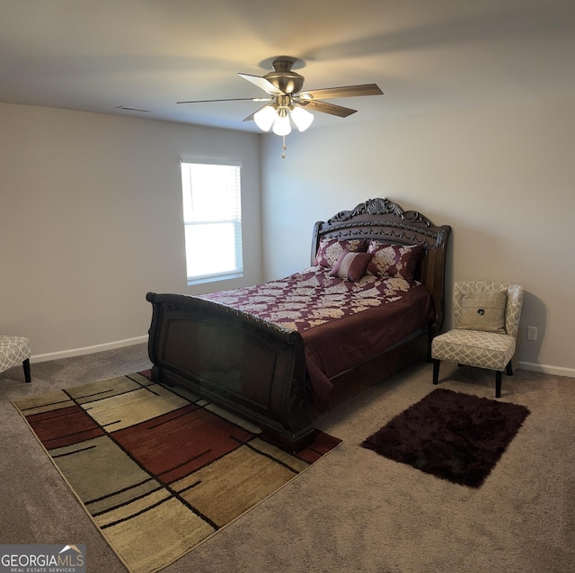 457 Panhandle Pl, Hampton, GA 30228 - carpeted bedroom with baseboards and ceiling fan