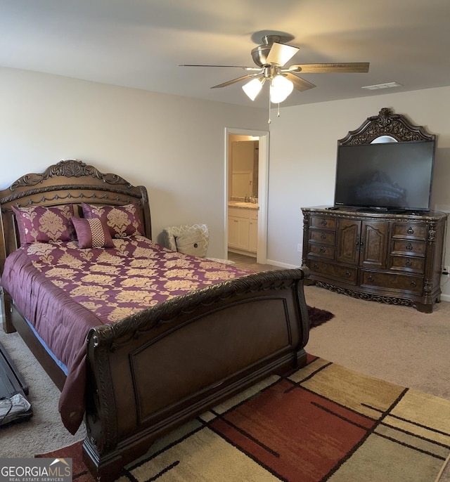 457 Panhandle Pl, Hampton, GA 30228 - bedroom featuring carpet floors, a ceiling fan, and ensuite bath