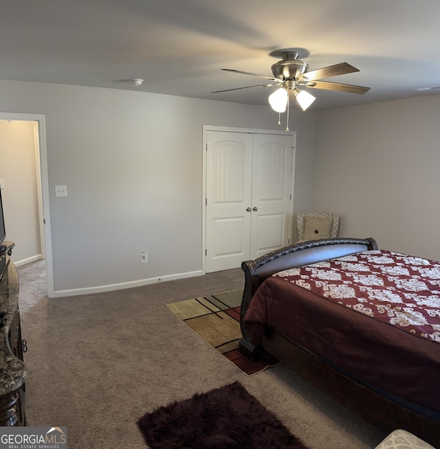 457 Panhandle Pl, Hampton, GA 30228 - bedroom featuring carpet, baseboards, a ceiling fan, and a closet