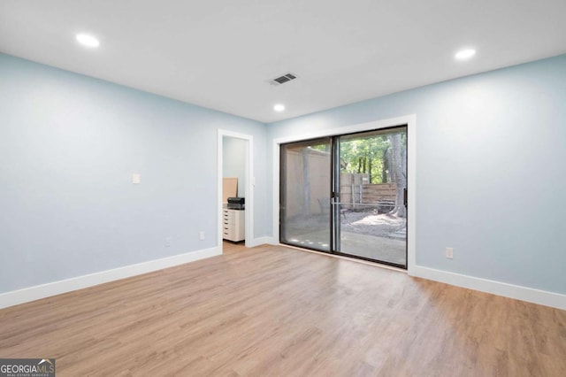 845 Lake Hollow Blvd SW, Marietta, GA 30064 - empty room with baseboards, light wood-style flooring, and recessed lighting