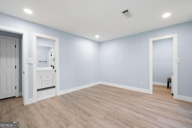 845 Lake Hollow Blvd SW, Marietta, GA 30064 - empty room with light wood-style floors, recessed lighting, and baseboards