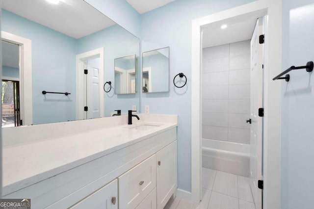 845 Lake Hollow Blvd SW, Marietta, GA 30064 - bathroom featuring vanity, recessed lighting, baseboards, and shower / tub combination