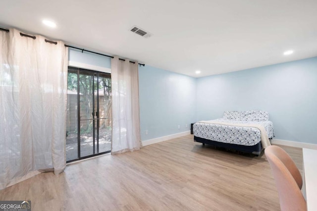 845 Lake Hollow Blvd SW, Marietta, GA 30064 - bedroom featuring access to outside, wood finished floors, baseboards, and recessed lighting