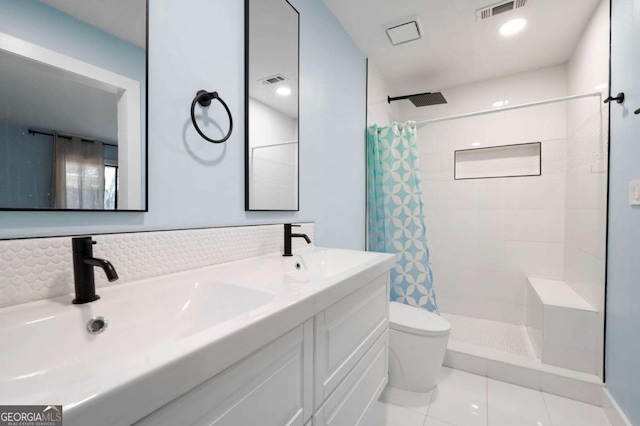 845 Lake Hollow Blvd SW, Marietta, GA 30064 - full bathroom featuring toilet, a tile shower, tile patterned flooring, and double vanity
