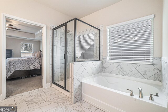3415 Linstead Ct, Loganville, GA 30052 - ensuite bathroom featuring a shower stall, marble look tiles, a bath, and crown molding