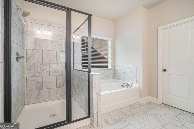3415 Linstead Ct, Loganville, GA 30052 - full bathroom featuring marble look tiles, a stall shower, and a bath