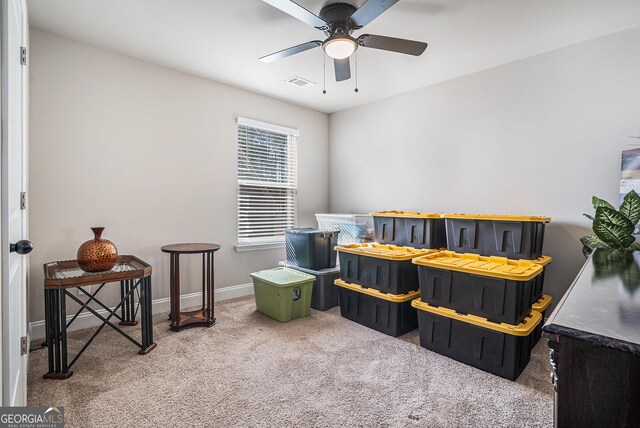 3415 Linstead Ct, Loganville, GA 30052 - carpeted bedroom with baseboards and a ceiling fan