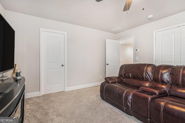 3415 Linstead Ct, Loganville, GA 30052 - living area featuring carpet, ceiling fan, and baseboards
