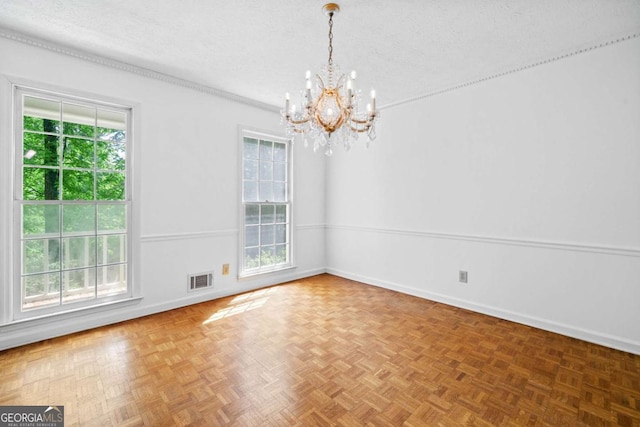 357 Breeze Hill Ln, Canton, GA 30114 - empty room with a chandelier and a textured ceiling