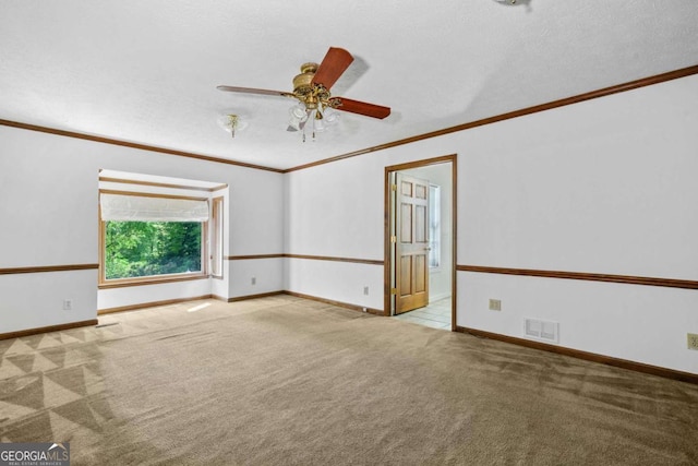 357 Breeze Hill Ln, Canton, GA 30114 - unfurnished room featuring crown molding, carpet flooring, ceiling fan, and a textured ceiling