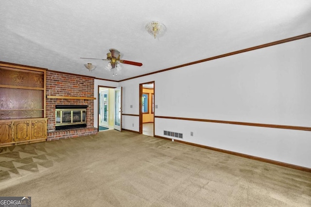 357 Breeze Hill Ln, Canton, GA 30114 - unfurnished living room with carpet, ceiling fan, a brick fireplace, and crown molding