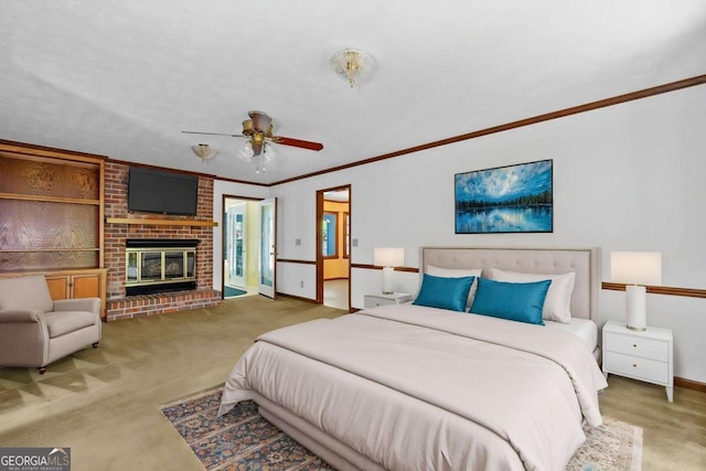 357 Breeze Hill Ln, Canton, GA 30114 - bedroom with carpet, ceiling fan, a brick fireplace, and ornamental molding