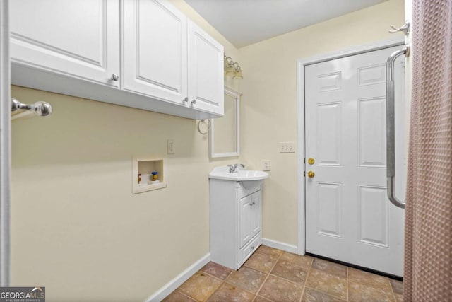 357 Breeze Hill Ln, Canton, GA 30114 - laundry area with hookup for a washing machine and cabinet space