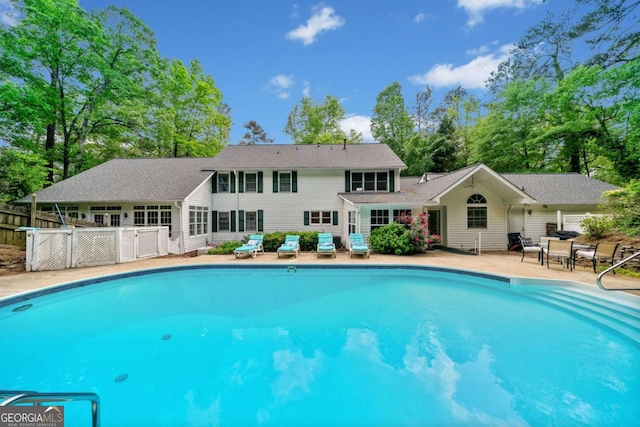 357 Breeze Hill Ln, Canton, GA 30114 - swimming pool featuring view of scattered trees and a patio