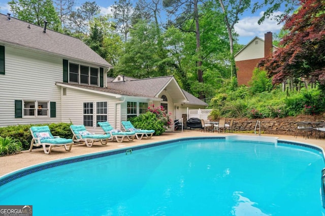 357 Breeze Hill Ln, Canton, GA 30114 - swimming pool with a patio area