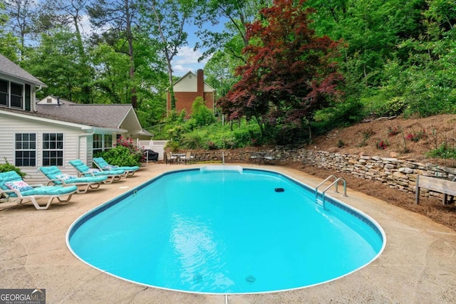 357 Breeze Hill Ln, Canton, GA 30114 - outdoor pool with a patio area