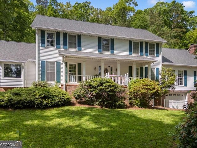 357 Breeze Hill Ln, Canton, GA 30114 - colonial home with a front lawn, a garage, and a porch