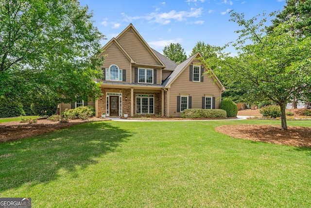 view of front of home with a front lawn and a porch