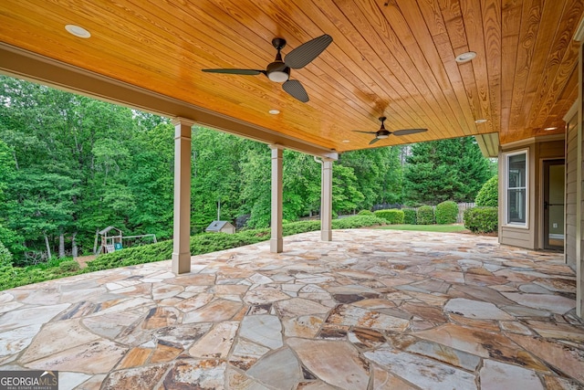 view of patio featuring ceiling fan