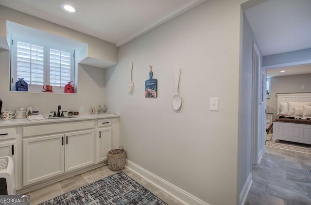 118 Arrowhead Dr, Cartersville, GA 30120 - bar with a sink, baseboards, and recessed lighting