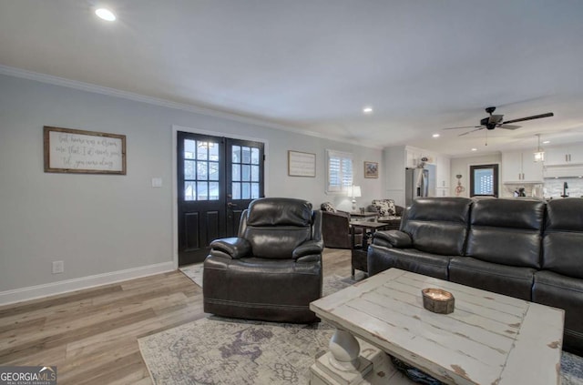 118 Arrowhead Dr, Cartersville, GA 30120 - living area featuring light wood finished floors, crown molding, recessed lighting, ceiling fan, and baseboards