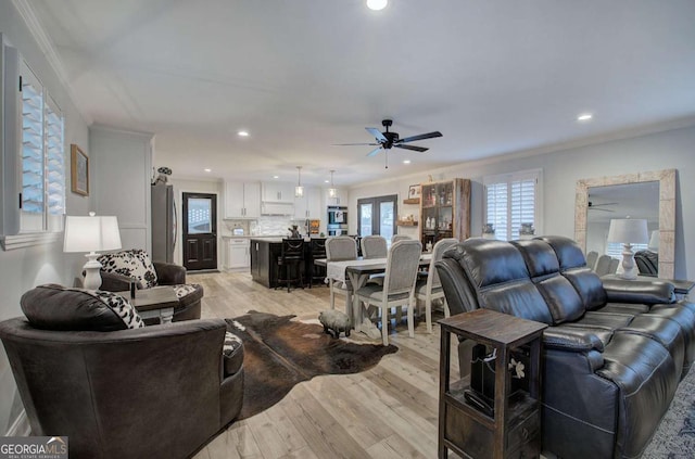 118 Arrowhead Dr, Cartersville, GA 30120 - living room with ceiling fan, light wood-style floors, crown molding, and recessed lighting