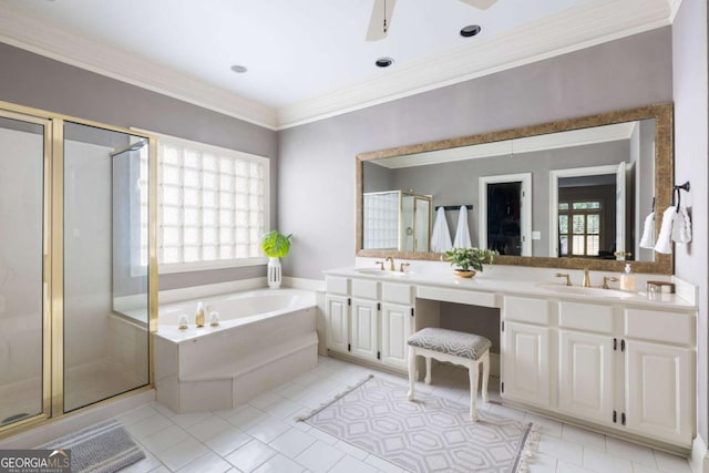 full bathroom featuring a shower stall, a bath, tile patterned floors, double vanity, and ornamental molding