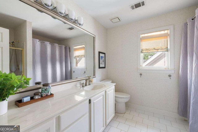 full bathroom with tile patterned flooring, toilet, and vanity