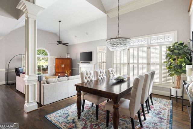 dining area featuring decorative columns, ceiling fan, baseboards, dark wood-style floors, and high vaulted ceiling