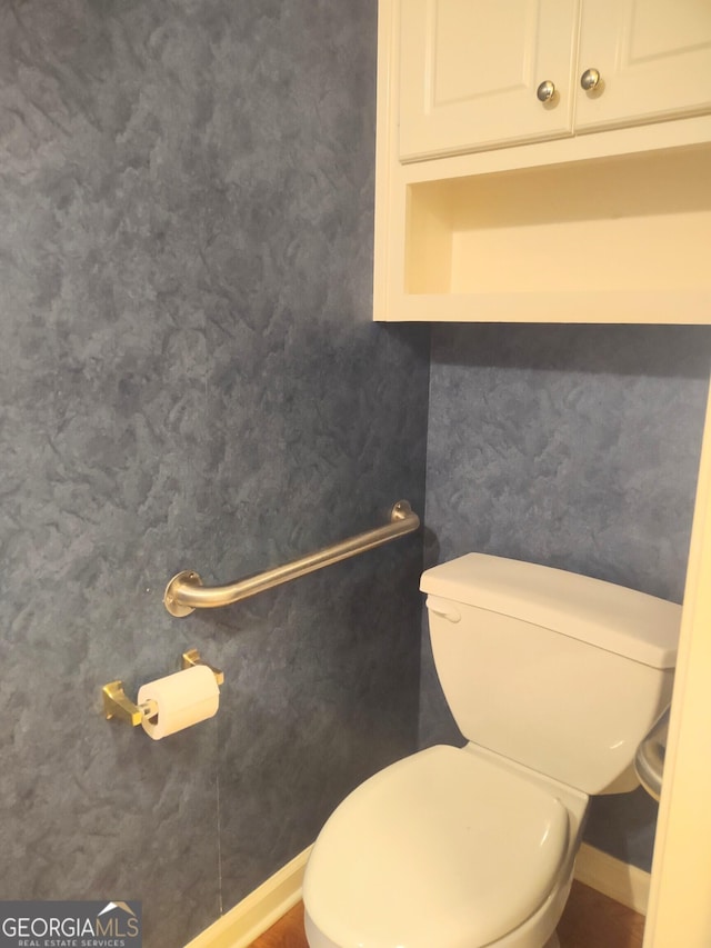 308 Bell Isle, Mcdonough, GA 30252 - bathroom featuring toilet and baseboards