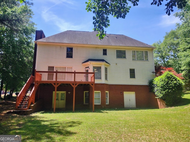 308 Bell Isle, Mcdonough, GA 30252 - back of property featuring a chimney, a lawn, a deck, and stairway