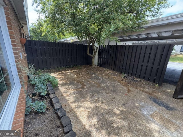 view of yard featuring fence