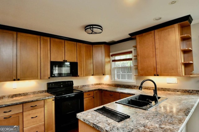kitchen with black appliances, open shelves, a sink, and a peninsula
