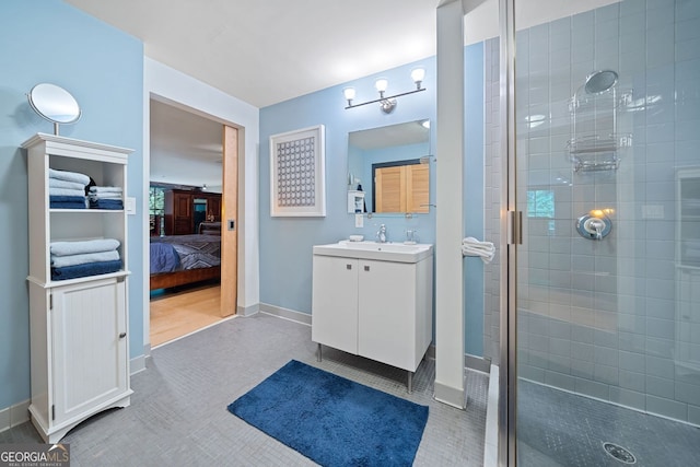 319 Atlanta St SE Unit 315, Marietta, GA 30060 - ensuite bathroom with a shower stall, vanity, and baseboards