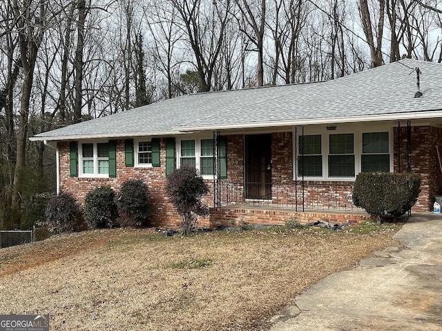1858 Sahara Dr SE, Atlanta, GA 30316 - single story home featuring a shingled roof and brick siding