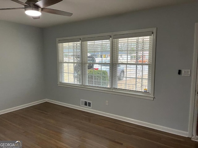 1858 Sahara Dr SE, Atlanta, GA 30316 - spare room with a ceiling fan, dark wood-style flooring, and baseboards