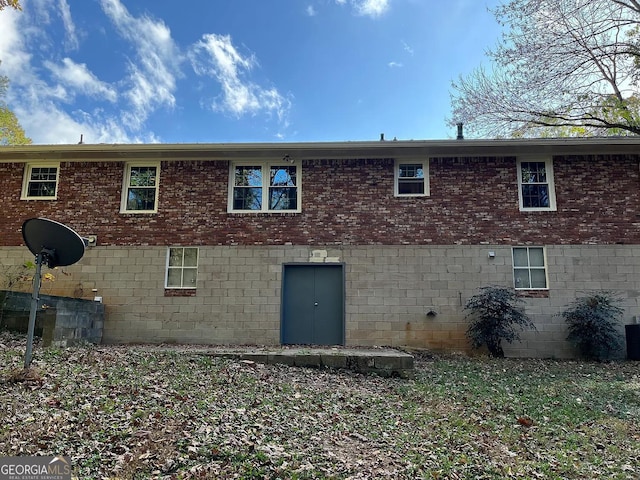 1858 Sahara Dr SE, Atlanta, GA 30316 - rear view of property featuring brick siding