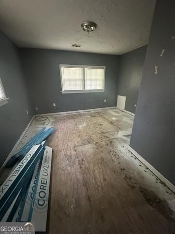 32 Haynie St Unit 0, Newnan, GA 30263 - unfurnished room featuring baseboards