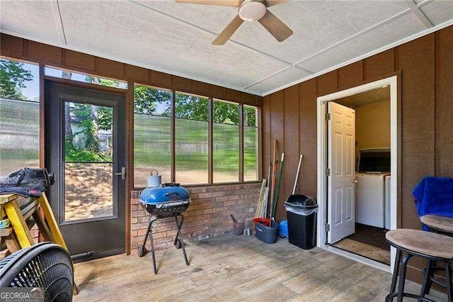 373 Dixie Ct, Lawrenceville, GA 30046 - sunroom / solarium with wood finished floors and a ceiling fan