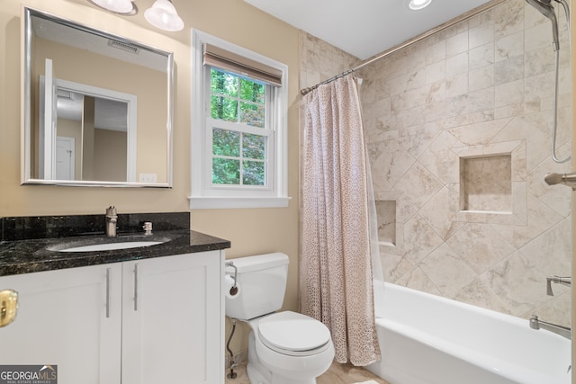 bathroom featuring vanity, toilet, and shower / bath combination with curtain