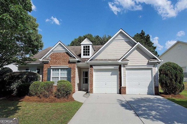 3350 Cooper Woods Dr, Loganville, GA 30052 - view of front of house with brick siding, concrete driveway, and a garage
