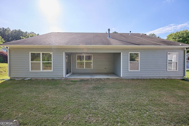 3350 Cooper Woods Dr, Loganville, GA 30052 - rear view of property featuring a patio area and a lawn